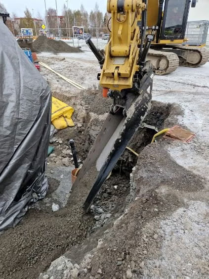 Återfyllnadsskopa för grävmaskin