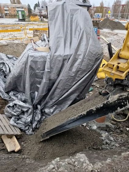 Återfyllnadsskopa för grävmaskin