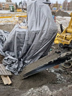 Återfyllnadsskopa för grävmaskin