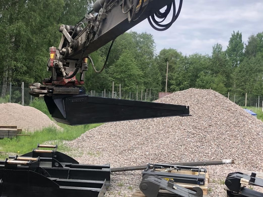 Återfyllnadsskopa för grävmaskin