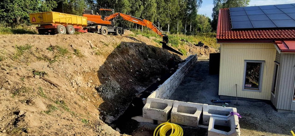 Återfyllnadsskopa för grävmaskin